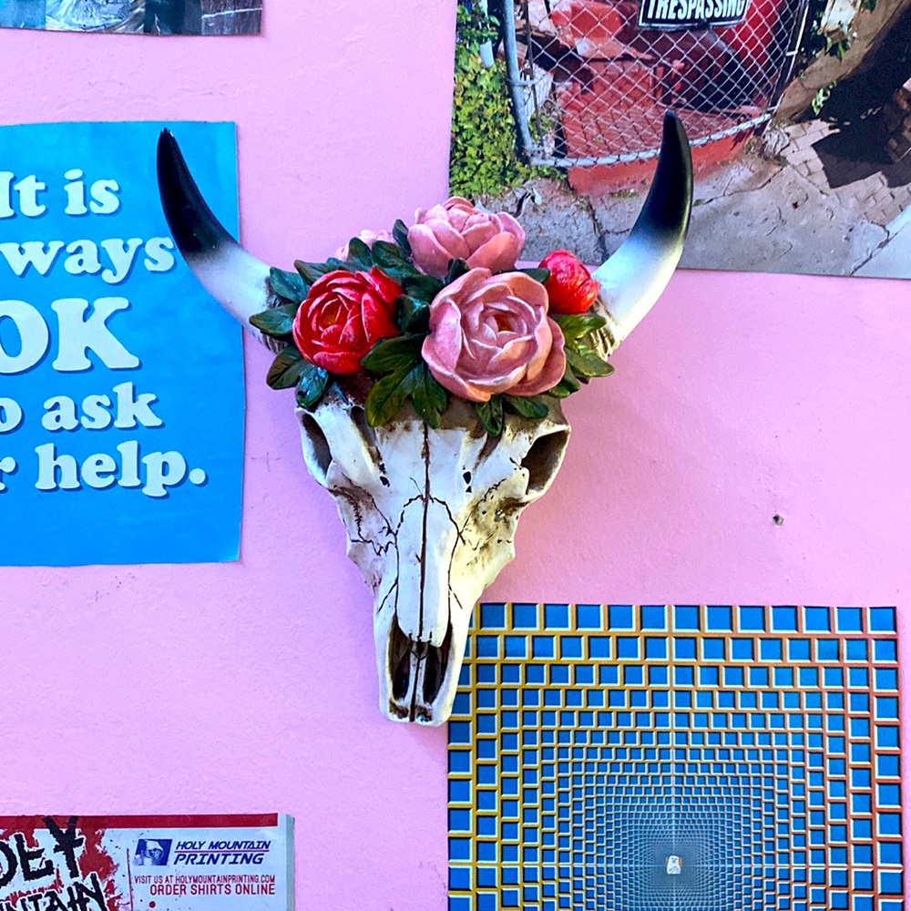 Fake cow skull with flowers
